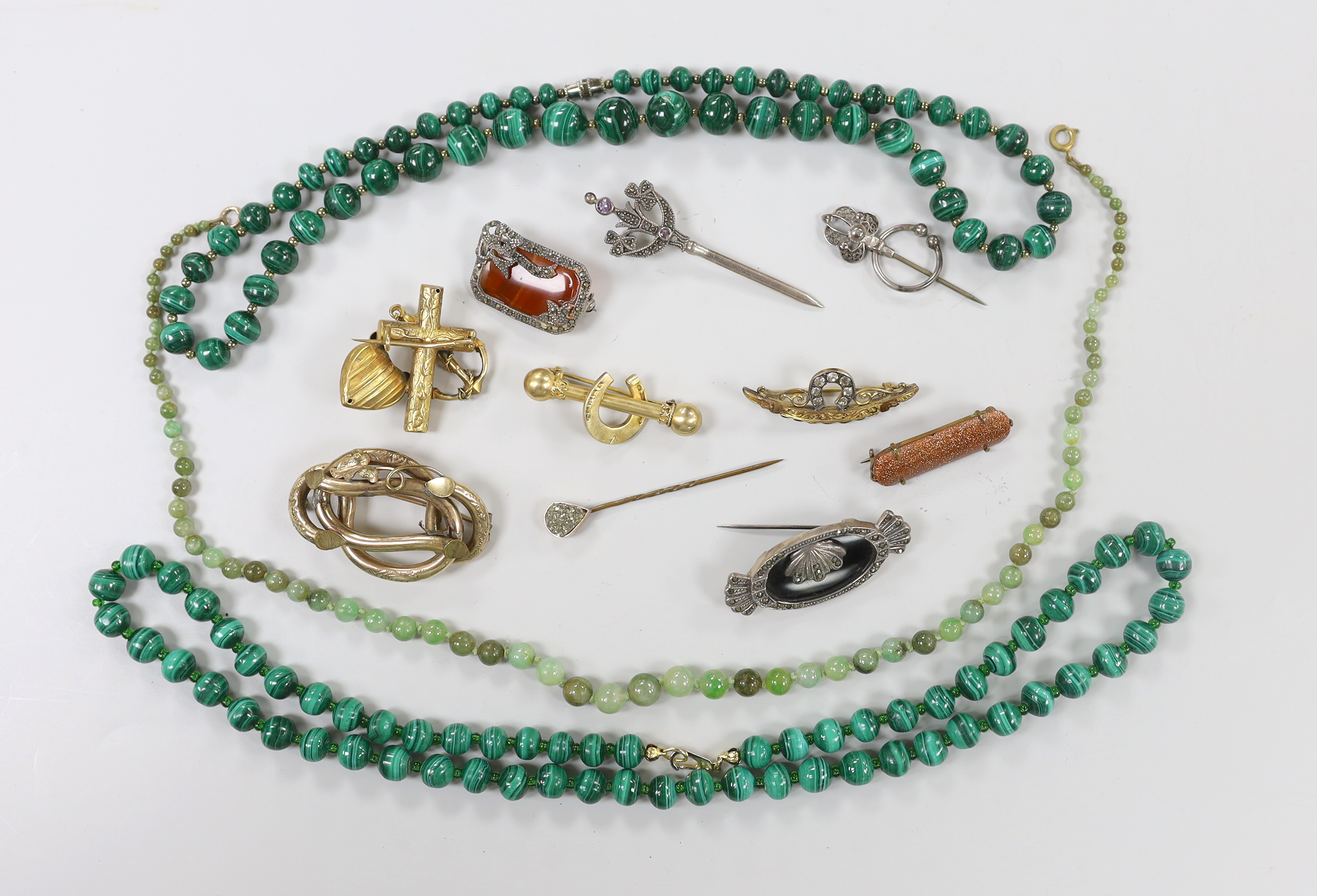 Sundry Victorian and later jewellery including pinchbeck brooches, marcasite set brooches, 925 and paste set sword brooch and malachite necklaces.